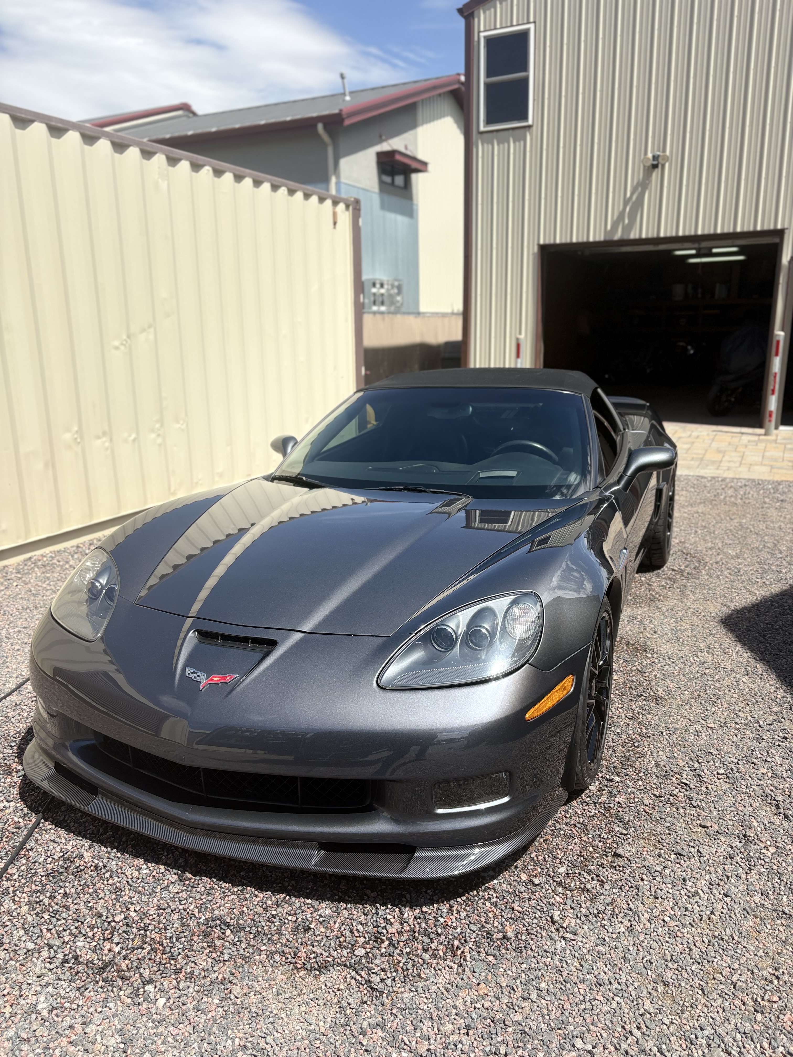 Gray C6 Corvette convertible cleaned and polished to a deep shine