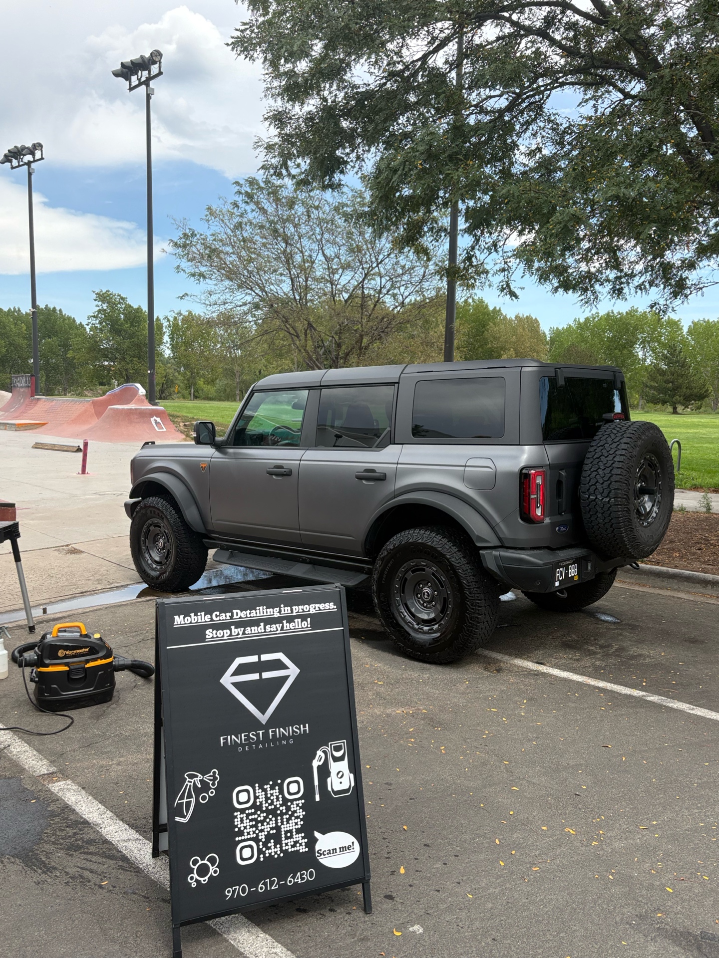Finest Finish Detailing mobile setup beside a Bronco